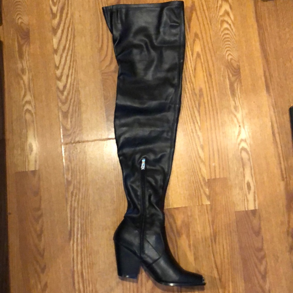 Fashion Nova thigh high boots black size 8 1/2 never worn. Still in original box